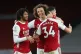 Arsenal's David Luiz (centre) with Mohamed Elneny (left) and