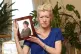 Jasna Badzak holding a 2014 photograph of her son Sven