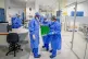 Health workers wearing full personal protective equipment