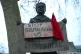 Statue with sign
