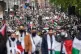 Protesters walk along Piccadily in central London, during a 