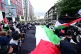 Protesters unfurl a Palestinian flag in Kensington, central 