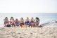 Oxfam campaigners pose as G7 leaders on Swanpool Beach near 