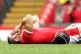Wales' Leigh Halfpenny receives treatment for an injury duri