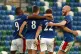 ELATED: Linfield’s Jamie Mulgrew (centre) celebrates scori