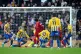 Liverpool's Roberto Firmino (centre) scores their side's thi