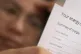 A person holding an energy bill