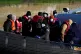A group of people are brought in to Dover, Kent, by Border F