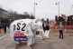 Environmental activists dressed as a white elephant protest 