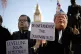 Two people dressed as Michael Gove and Boris Johnson join pe