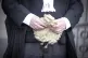 An advocate carrying his wig outside Edinburgh Sheriff Court