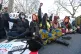 People attend the protest organised by the feminist action g