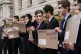 Campaigners dressed as Rishi Sunak protest outside the Treas