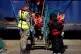 Young children among a group of people brought in to Dover, 