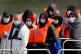 A group of people are brought in to Dover, Kent, following a