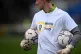 Forest Green Rovers goalkeeper Lewis Thomas warms up wearing