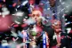 Ronnie O'Sullivan celebrates with the trophy during day seve