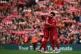 Liverpool's Fabinho (left) and team-mate Mohamed Salah embra