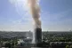 Smoke billows from a fire that engulfed the 24-storey Grenfe