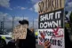 Migrants rights groups hold a show of support for people det