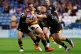 Huddersfield Giants' Tuimoala Lolohea (left) is tackled by S