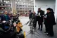 Chris Kaba's cousin Jefferson Bosela reads a statement outsi