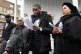 Chris Kaba's cousin Jefferson Bosela reads a statement outsi
