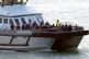 A group of people are brought in to Dover, Kent, onboard a B