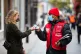 A Big Issue vendor making a sale