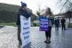 A member of the Scottish Family Party (left) speaks with a s