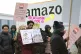 
Members of the GMB union during a rally outside the Amazon