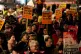 Protesters outside Downing Street, London, demonstrating aga