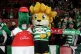 Arsenal mascot Gunnersaurus Rex (left) and Sporting Lisbon m