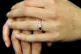 A person wearing a engagement ring