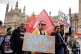 NHS workers take part in a march from St Thomas' Hospital to