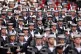 Members of the military march along the Mall during the Char
