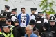 Police speak with a Just Stop Oil protester in central Londo