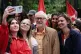Former Labour leader Jeremy Corbyn (centre) has his picture 
