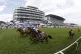 Prosperous Voyage ridden by Frankie Dettori (left) wins The 