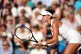 Belinda Bencic in action against Iga Swiatek (not pictured) 