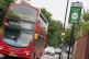 A London bus passes an information sign for the Ultra Low Em