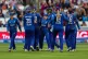 England players celebrates after Australia's Ashleigh Gardne