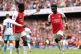 Arsenal's Bukayo Saka (right) celebrates scoring their side'