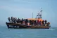 A group of people are brought in to Dungeness, Kent, onboard