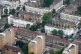 An aerial view of terraced housing and blocks of flats in we