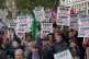 People take part in a protest organised by the Rail, Maritim