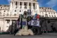 Protestors wearing Andrew Bailey and Rishi Sunak masks outsi