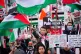 People at a rally in Trafalgar Square, London, calling for a