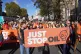 Just Stop Oil protesters take part in a walking protest bloc