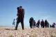 A group of people are brought in to Dungeness, Kent, onboard